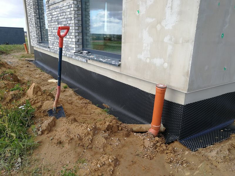 Drainage pipe installation around foundation